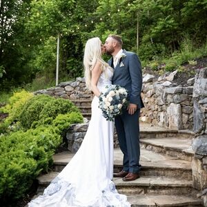 Wedding gown, size 6, stunning w/train and plunging neckline.